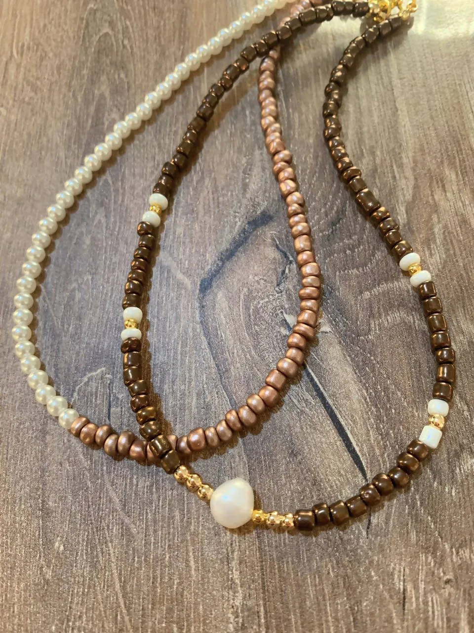 Brown choker with one pearl